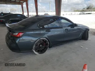 2024 BMW M3 Competition xDrive with VIN WBS43AY01RFS01430, listed as a Copart auction lot 53973245 with 6,584 mi miles and Salvage title. Bid and sale history available at DreamBid. Image 3.