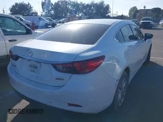 2015 Mazda 6 i Sport with VIN JM1GJ1U59F1211787, listed as a IAAI auction lot 41645517 with 83,537 mi miles. Bid and sale history available at carsss.com. Image 4.