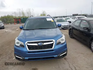 2017 Subaru Forester Touring with VIN JF2SJAWC4HH803275, listed as a IAAI auction lot 42109087 with 114,532 mi miles and . Bid and sale history available at DreamBid. Image 13.