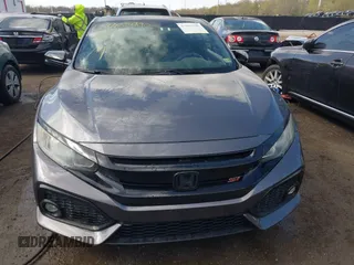 2017 Honda Civic Si with VIN 2HGFC3A56HH754672, listed as a IAAI auction lot 41967990 with 115,091 mi miles and . Bid and sale history available at DreamBid. Image 12.