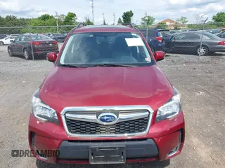 2014 Subaru Forester XT Touring with VIN JF2SJGMC1EH500150, listed as a IAAI auction lot 42201409 with 106,728 mi miles and . Bid and sale history available at DreamBid. Image 12.