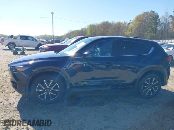 2018 Mazda CX-5 Grand Touring with VIN JM3KFADM1J0322049, listed as a IAAI auction lot 41891079 with 174,939 mi miles and . Bid and sale history available at DreamBid. Image 14.