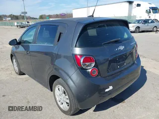 2013 Chevrolet Sonic LT with VIN 1G1JC6SB1D4164944, listed as a IAAI auction lot 41496975 with 96,987 mi miles. Bid and sale history available at carsss.com. Image 3.