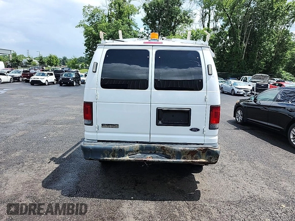 2011 Ford Econoline Cargo Commercial z VIN 1FTNE2EL2BDB32114, wystawiony jako IAAI lot #42774199 z przebiegiem 130 449 mil mil oraz . Historia ofert i sprzedaży dostępna na DreamBid. Obrazek 22.