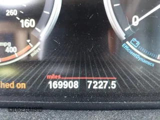 2014 BMW X5 xDrive35d with VIN 5UXKS4C57E0J93982, listed as a IAAI auction lot 42085173 with 169,908 mi miles. Bid and sale history available at carsss.com. Image 16.