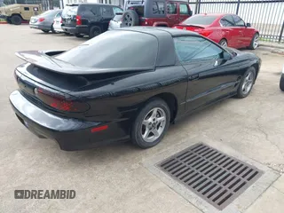 2000 Pontiac Firebird Formula z VIN 2G2FV22G1Y2104657, wystawiony jako IAAI lot #41510589 z przebiegiem Nie podano mil oraz . Historia ofert i sprzedaży dostępna na DreamBid. Obrazek 4.