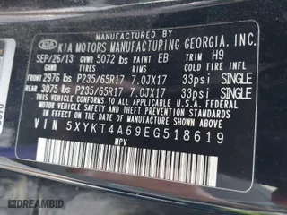 2014 Kia Sorento LX with VIN 5XYKT4A69EG518619, listed as a IAAI auction lot 42029285 with 187,976 mi miles. Bid and sale history available at carsss.com. Image 9.