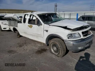 2002 Ford F-150 XL with VIN 1FTRX18L12NA01509, listed as a Copart auction lot 51098435 with Not provided miles and Salvage title. Bid and sale history available at DreamBid. Image 4.