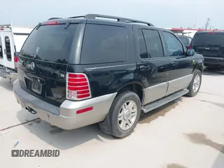 2003 Mercury Mountaineer Convenience z VIN 4M2ZU66W93ZJ43937, wystawiony jako IAAI lot #42303254 z przebiegiem 184 057 mil mil oraz . Historia ofert i sprzedaży dostępna na DreamBid. Obrazek 4.