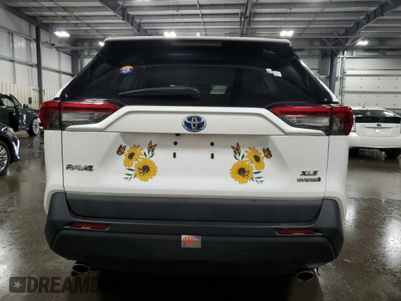 2019 Toyota RAV4 Hybrid XLE with VIN 2T3RWRFV1KW016526, listed as a Copart auction lot 61466435 with 64,255 mi miles and Salvage title. Bid and sale history available at DreamBid. Image 6.