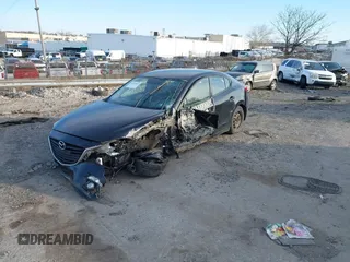 2015 Mazda 3 i SV with VIN JM1BM1T74F1246158, listed as a IAAI auction lot 41587923 with 147,001 mi miles. Bid and sale history available at carsss.com. Image 20.