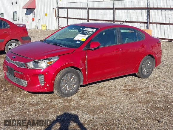 2019 Kia Rio S with VIN 3KPA24AB4KE227322, listed as a IAAI auction lot 40890906 with 114,215 mi miles. Bid and sale history available at carsss.com. Image 2.