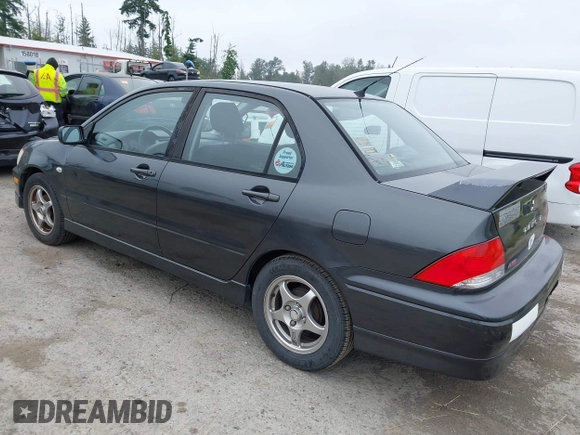 2002 Mitsubishi Lancer OZ-Rally z VIN JA3AJ86EX2U059845, wystawiony jako IAAI lot #42371709 z przebiegiem 207 665 mil mil oraz . Historia ofert i sprzedaży dostępna na DreamBid. Obrazek 3.