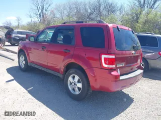 2010 Ford Escape XLT with VIN 1FMCU0D75AKB11394, listed as a IAAI auction lot 42037996 with 150,815 mi miles. Bid and sale history available at carsss.com. Image 3.