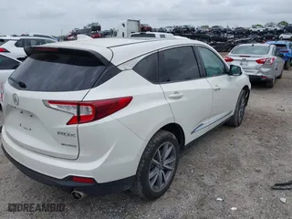 2019 Acura RDX w/Technology Pkg with VIN 5J8TC2H55KL031585, listed as a IAAI auction lot 41758776 with 55,144 mi miles. Bid and sale history available at carsss.com. Image 4.