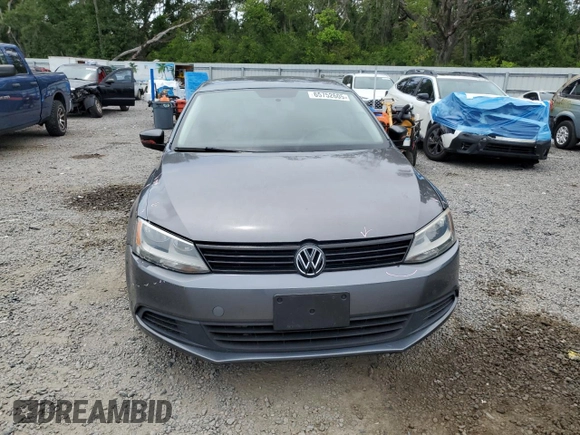 2014 Volkswagen Jetta S with VIN 3VW2K7AJ8EM231099, listed as a Copart auction lot 65752605 with 143,010 mi miles and Salvage title. Bid and sale history available at DreamBid. Image 5.