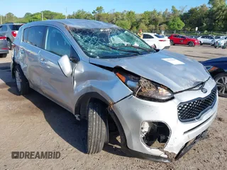 2019 Kia Sportage LX with VIN KNDPM3AC8K7591055, listed as a IAAI auction lot 41962190 with 74,003 mi miles. Bid and sale history available at carsss.com. Image 1.