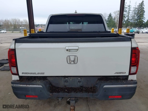 2017 Honda Ridgeline RTL-E with VIN 5FPYK3F7XHB030551, listed as a IAAI auction lot 41903844 with 153,594 mi miles. Bid and sale history available at carsss.com. Image 16.