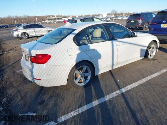 2014 BMW 3 Series 328i xDrive with VIN WBA3B5G58ENS08415, listed as a IAAI auction lot 41642668 with 51,563 mi miles and . Bid and sale history available at DreamBid. Image 4.