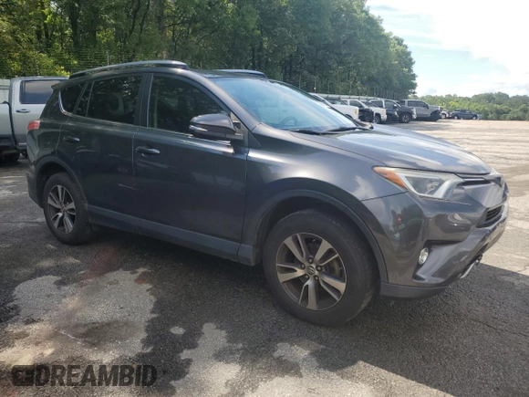 2018 Toyota RAV4 XLE with VIN JTMWFREV5JJ747297, listed as a Copart auction lot 56371505 with 215,598 mi miles and Clean Title. Bid and sale history available at DreamBid. Image 5.