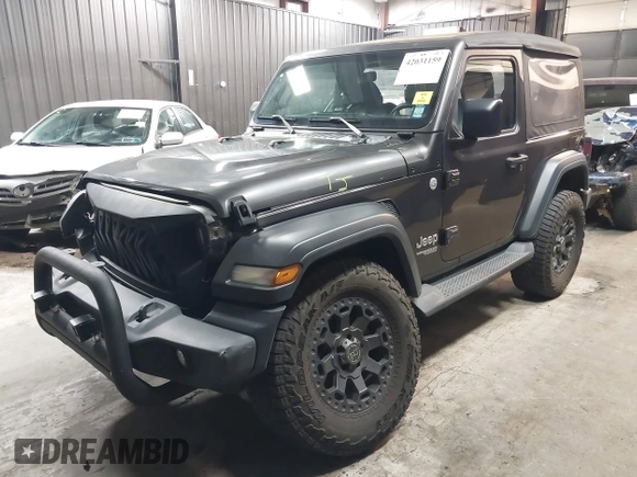 2021 Jeep Wrangler Sport S with VIN 1C4HJXAG2MW502452, listed as a IAAI auction lot 42031159 with 87,952 mi miles and . Bid and sale history available at DreamBid. Image 18.
