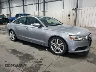 2015 Audi A6 Premium Plus with VIN WAUGFAFC7FN019738, listed as a Copart auction lot 54540785 with 135,950 mi miles and Salvage title. Bid and sale history available at DreamBid. Image 4.