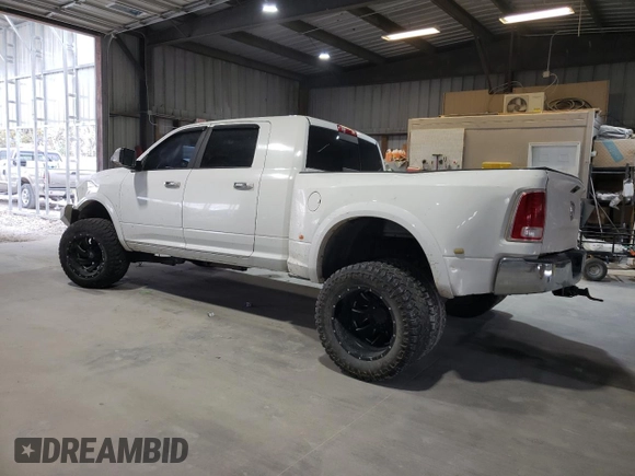 2014 Ram 3500 Laramie with VIN 3C63RRML4EG198281, listed as a Copart auction lot 78450724 with 212,689 mi miles and Salvage Title. Bid and sale history available at carsss.com. Image 2.