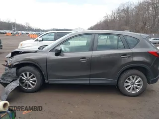 2016 Mazda CX-5 Sport with VIN JM3KE4BY8G0895209, listed as a IAAI auction lot 41688405 with 115,954 mi miles. Bid and sale history available at carsss.com. Image 14.
