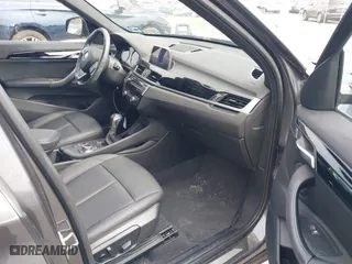 2019 BMW X1 xDrive28i with VIN WBXHT3C51K5L90571, listed as a IAAI auction lot 41909209 with 35,902 mi miles. Bid and sale history available at carsss.com. Image 5.
