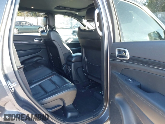 2021 Jeep Grand Cherokee 80th Anniversary z VIN 1C4RJFBG5MC737412, wystawiony jako IAAI lot #41753550 z przebiegiem 54 921 mil mil oraz . Historia ofert i sprzedaży dostępna na DreamBid. Obrazek 8.