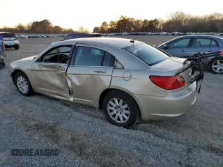 2010 Chrysler Sebring Touring z VIN 1C3CC4FBXAN119459, wystawiony jako Copart lot #47165515 z przebiegiem 125 382 mil mil oraz Szkoda całkowita • Salvage title. Historia ofert i sprzedaży dostępna na DreamBid. Obrazek 2.