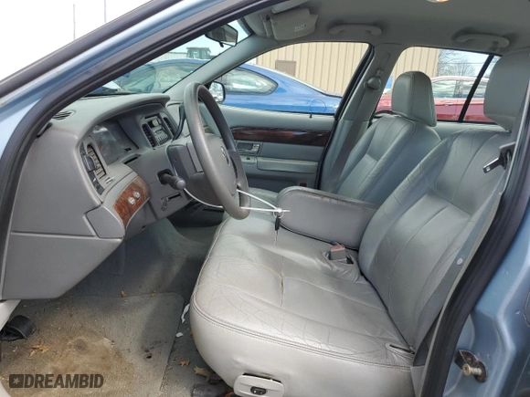 2005 Mercury Grand Marquis GS with VIN 2MEFM74W25X624329, listed as a Copart auction lot 50945805 with 140,717 mi miles and Clean Title. Bid and sale history available at carsss.com. Image 7.