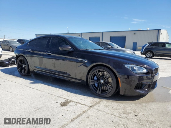 2014 BMW M6 z VIN WBS6C9C51EDV73883, wystawiony jako Copart lot #76395574 z przebiegiem 57 995 mil mil oraz Czysty tytuł • Clean title. Historia ofert i sprzedaży dostępna na DreamBid. Obrazek 4.