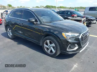 2020 Audi Q3 Premium z VIN WA1AECF35L1021332, wystawiony jako IAAI lot #42200345 z przebiegiem 78 941 mil mil oraz . Historia ofert i sprzedaży dostępna na DreamBid. Obrazek 1.