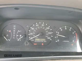 1999 Toyota Camry LE z VIN JT2BF22K8X0181675, wystawiony jako Copart lot #55057875 z przebiegiem 184 657 mil mil oraz Szkoda całkowita • Salvage title. Historia ofert i sprzedaży dostępna na DreamBid. Obrazek 9.