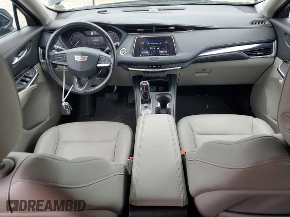 2021 Cadillac XT4 AWD Luxury with VIN 1GYFZBR4XMF014647, listed as a Copart auction lot 63800444 with 49,724 mi miles and Salvage Title. Bid and sale history available at carsss.com. Image 8.