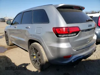 2018 Jeep Grand Cherokee with VIN NJ1454E, listed as a Copart auction lot 48051693 with 66,894 mi miles and Salvage title. Bid and sale history available at DreamBid. Image 2.