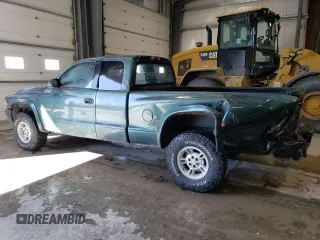 1999 Dodge Dakota SLT with VIN 1B7GG22Y9XS149398, listed as a Copart auction lot 47950025 with 173,413 mi miles and Salvage Title. Bid and sale history available at carsss.com. Image 2.