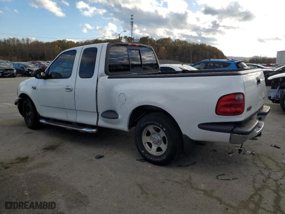 2003 Ford F-150 XL with VIN 1FTRX07243KA29505, listed as a Copart auction lot 79263674 with 188,516 mi miles and Salvage Title. Bid and sale history available at carsss.com. Image 2.