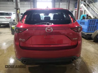 2020 Mazda CX-5 Grand Touring with VIN JM3KFBDM2L1771632, listed as a Copart auction lot 52894945 with 34,926 mi miles and Salvage Title. Bid and sale history available at carsss.com. Image 6.