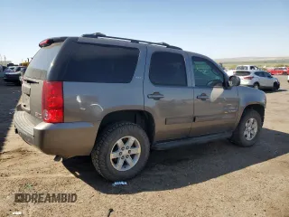 2013 GMC Yukon SLT with VIN 1GKS2CE02DR318091, listed as a Copart auction lot 70860184 with 127,879 mi miles and Salvage Title. Bid and sale history available at carsss.com. Image 3.