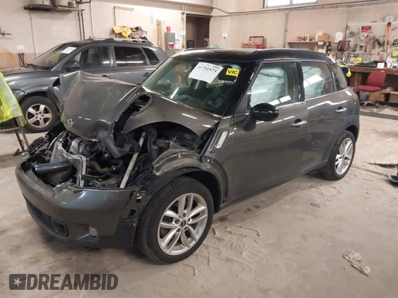 2012 MINI Countryman S with VIN WMWZC3C59CWL83491, listed as a IAAI auction lot 41791573 with 115,355 mi miles and . Bid and sale history available at DreamBid. Image 2.