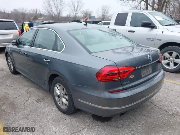 2016 Volkswagen Passat 1.8T S with VIN 1VWAS7A31GC052520, listed as a IAAI auction lot 41547408 with 129,730 mi miles. Bid and sale history available at carsss.com. Image 3.