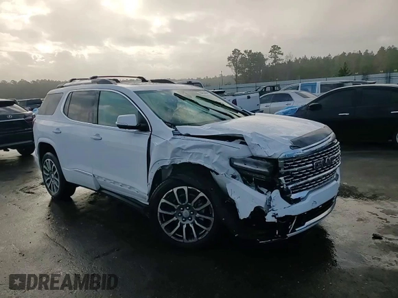 2023 GMC Acadia Denali with VIN 1GKKNPLS1PZ247635, listed as a Copart auction lot 84953044 with 12,869 mi miles and Salvage title. Bid and sale history available at DreamBid. Image 14.