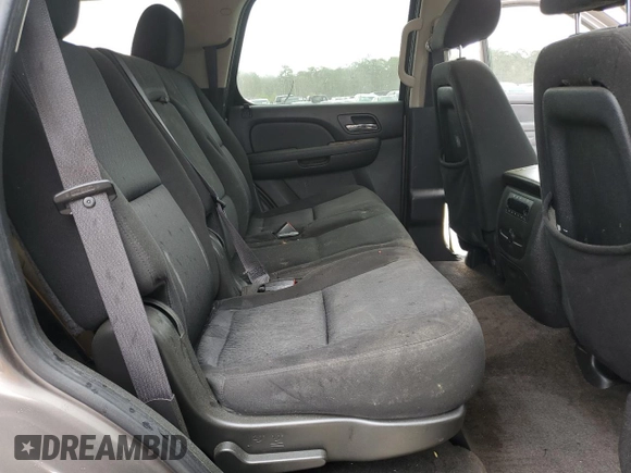 2011 Chevrolet Tahoe LS with VIN 1GNSCAE09BR138852, listed as a Copart auction lot 49165595 with 207,548 mi miles and Salvage title. Bid and sale history available at DreamBid. Image 12.
