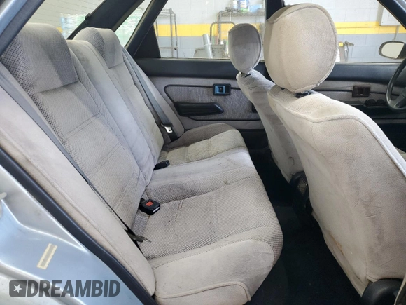 1992 Geo Prizm z VIN 1Y1SK5466NZ069241, wystawiony jako Copart lot #55314255 z przebiegiem 256 418 mil mil oraz Szkody całkowita. Historia ofert i sprzedaży dostępna na DreamBid. Obrazek 10.