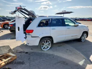 2014 Jeep Grand Cherokee Summit with VIN 1C4RJFJG9EC338666, listed as a Copart auction lot 63834075 with 196,840 mi miles and Salvage title. Bid and sale history available at DreamBid. Image 3.