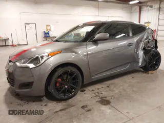 2016 Hyundai Veloster with VIN KMHTC6ADXGU272594, listed as a IAAI auction lot 42437409 with 91,620 mi miles and . Bid and sale history available at DreamBid. Image 2.