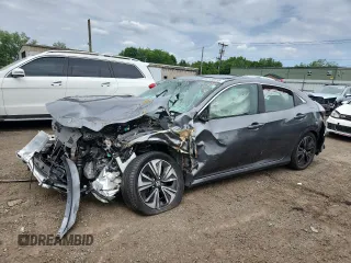 2018 Honda Civic EX z VIN SHHFK7H54JU408497, wystawiony jako Copart lot #61025485 z przebiegiem Nie podano mil oraz Szkoda całkowita • Salvage title. Historia ofert i sprzedaży dostępna na DreamBid. Obrazek 1.