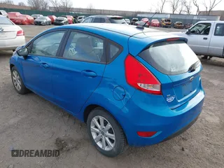 2013 Ford Fiesta SE with VIN 3FADP4EJ6DM130511, listed as a IAAI auction lot 41757636 with 153,664 mi miles. Bid and sale history available at carsss.com. Image 3.